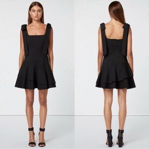 Elliatt, black mini dress with tie shoulder details.